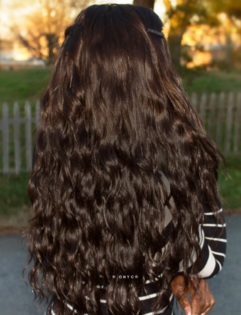 ONYC-CEO-Thelma-Okoro-wearing-ONYC-Body-2-Wavy-Virgin-Wavy-Hair-Bundles-Sew-in-Weft-Extensions-Human-Hair-for-2B-to-2C-Hair-Texture-Back-View.webp Virgin Wavy Hair Bundles Sew in Extensions – ONYC Body-2-Wavy™ - Image 5